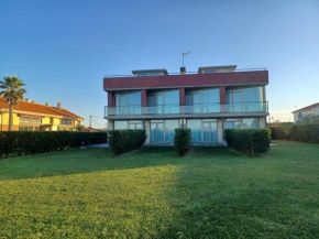 Гостиница Apartamentos Playa de Portio  Лиенкрес